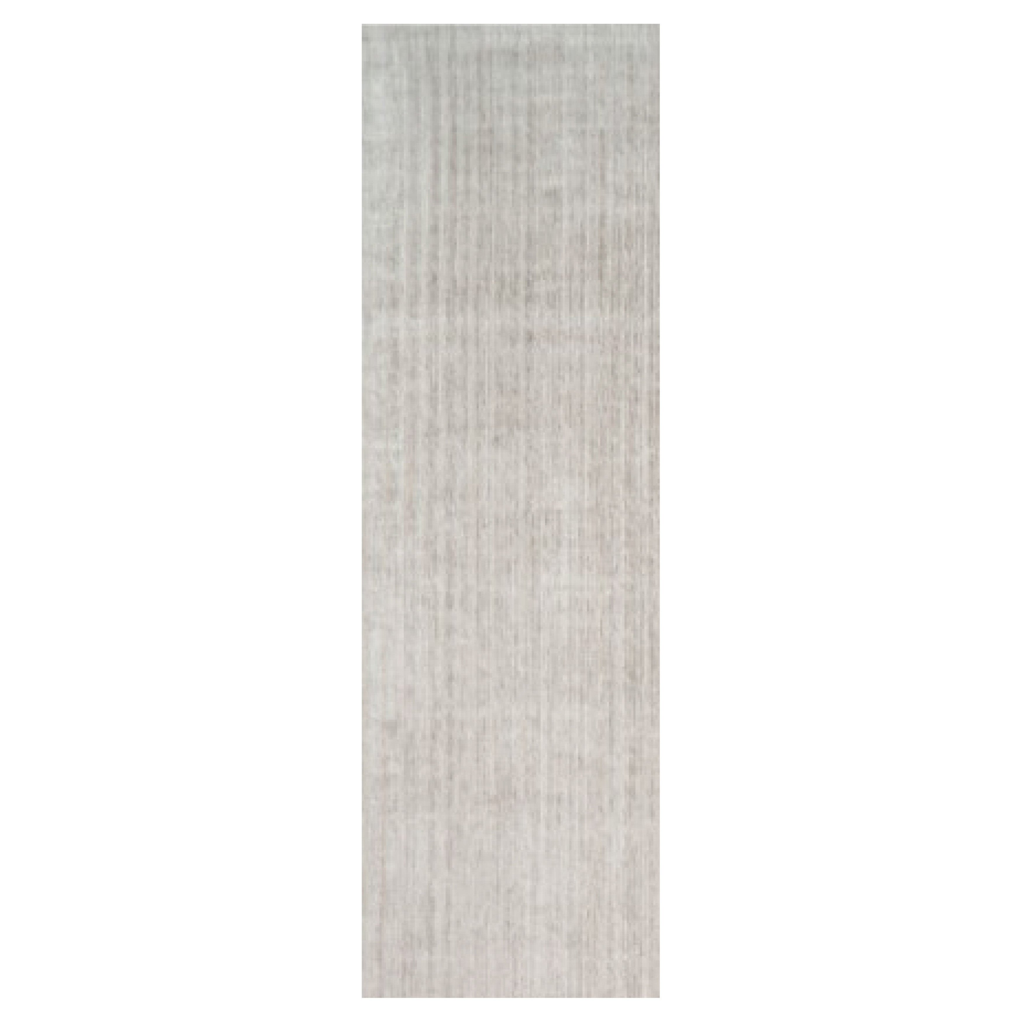 Tapis texturé surdimensionné de Rug & Kilim dans des tons beige et crème unis et des rayures