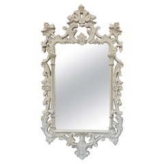 Specchio da parete italiano anni '70 in legno intagliato e composizione in stile Chippendale