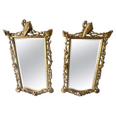 Extraordinary Pair of Italian Carved Giltwood Mirrors with Shell and Coral Motif
