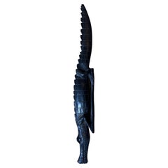 Alligator linéaire en bois sculpté