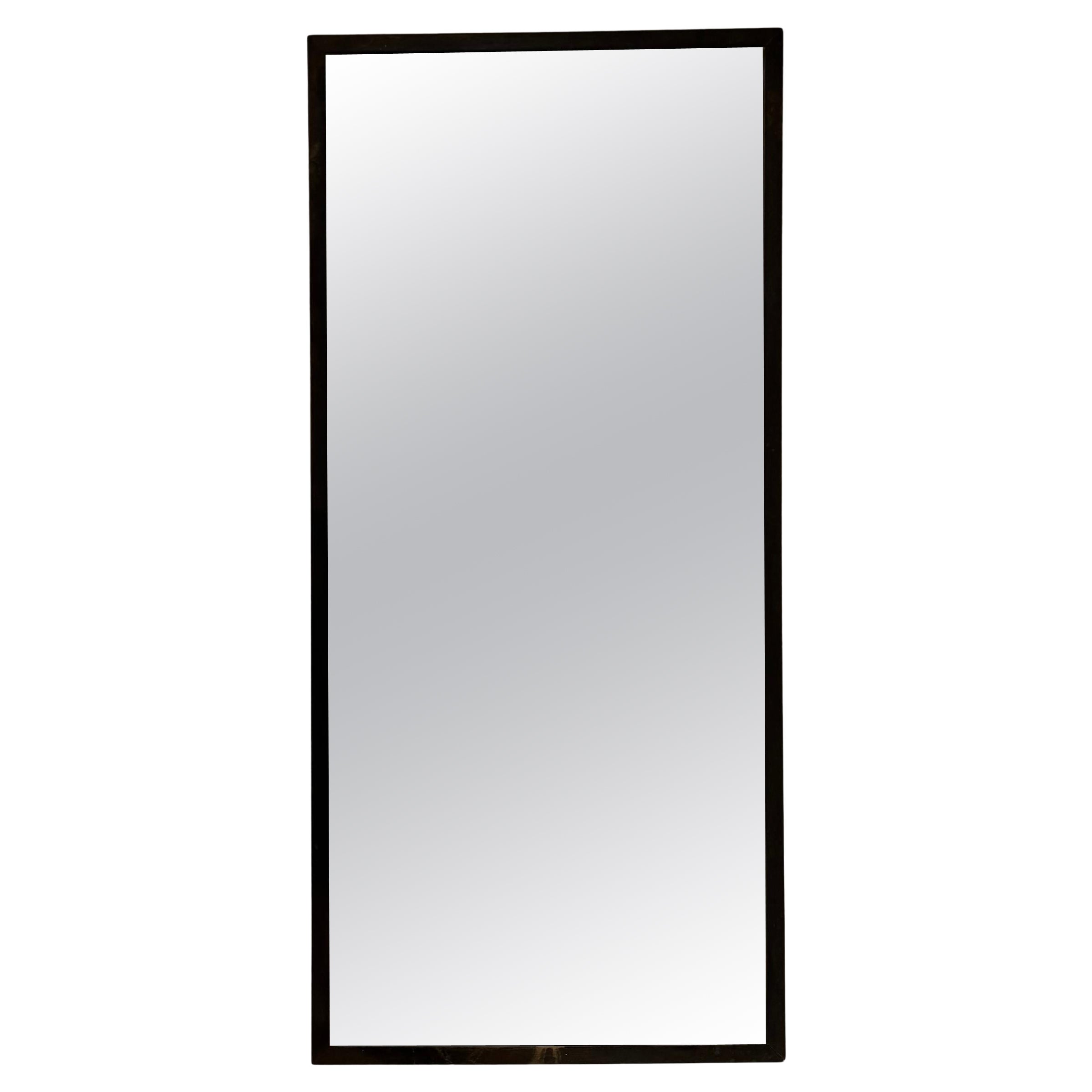 Miroir à encadrement en métal doré patiné bronze français en vente