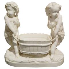 German Porcelain Figural Jardiniere Depicting Putti, 19th-20th Century