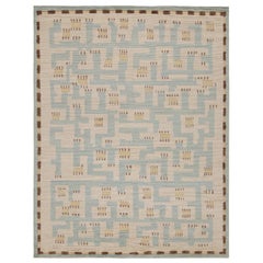 Rug & Kilim’s Scandinavian style Rug with Blue and Beige Geometric Patterns