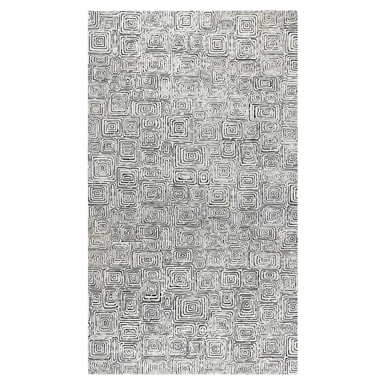 Tappeto moderno Quagmire in lana geometrica bianca e nera di Doris White Blau