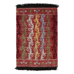 Rug & Kilim’s Caucasian Tribal Rug in Red with Vine Scroll Pictorials