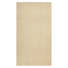 Rug & Kilim’s Contemporary Textural Solid Rug in Beige