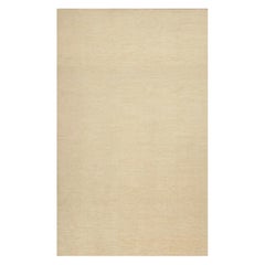 Rug & Kilim’s Contemporary Textural Solid Rug in Beige