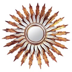 Sunburst mirror with gold and silver leaf, France, 1950s