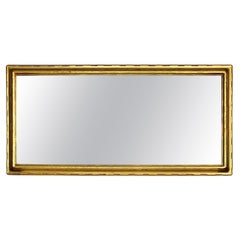 Miroir de cheminée rectangulaire en bois doré sculpté des années 1940
