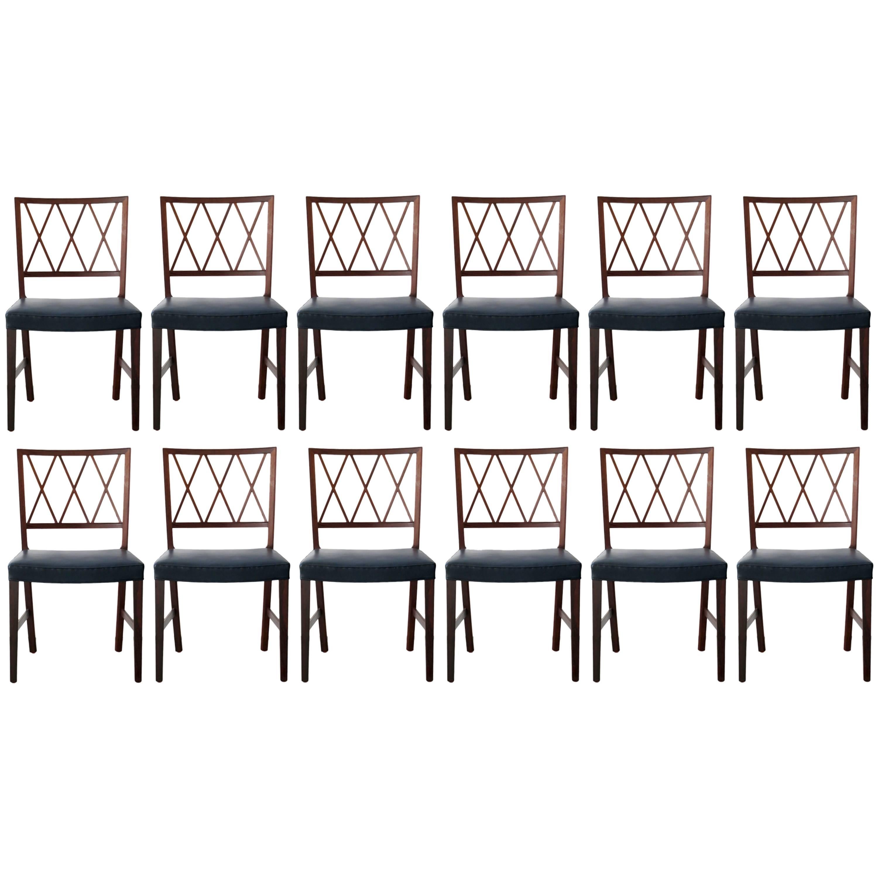 Twelve Exceptional Brazilian Rosewood Dining Chairs by Ole Wanscher For Sale