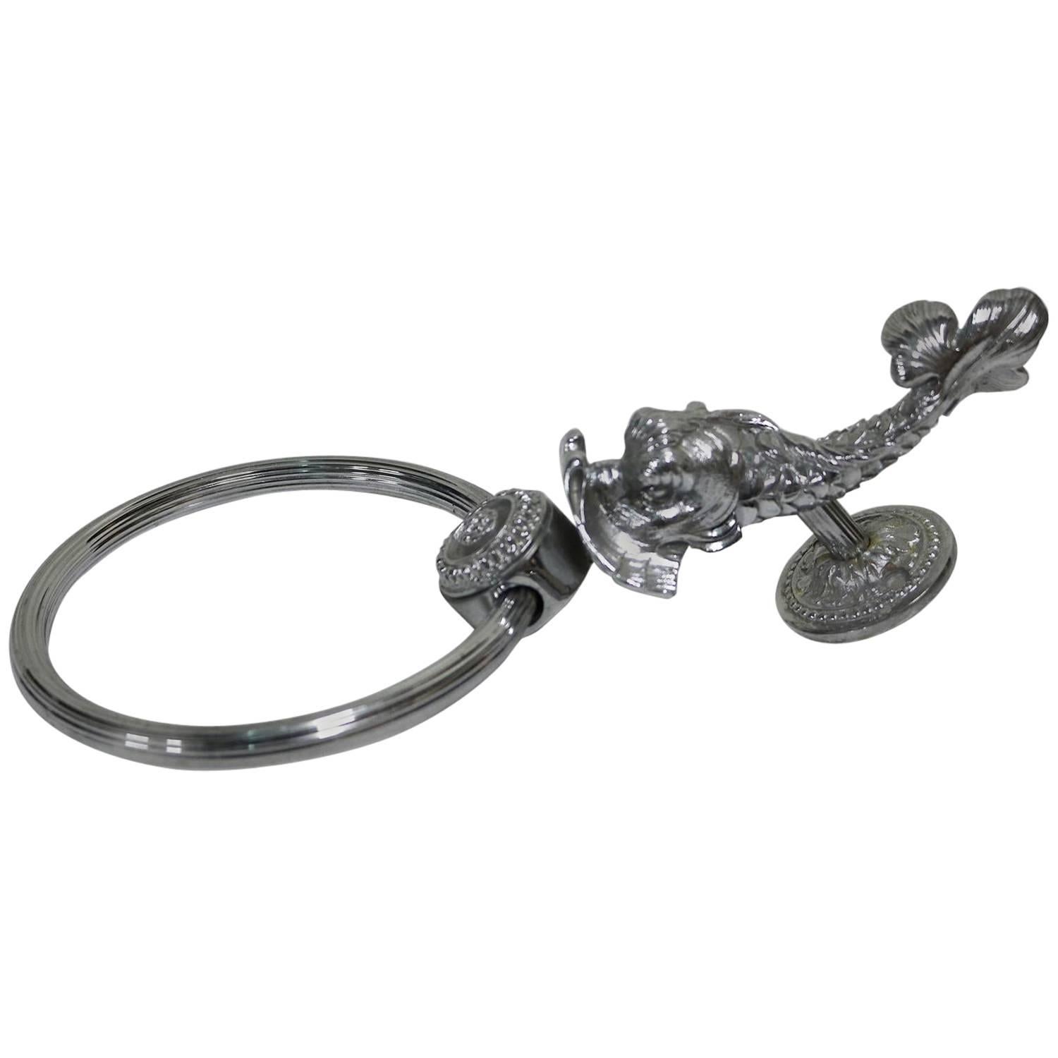 A rare silver finish SW dolphin towel ring.
The dolphin basin set is a Sherle Wagner Classic and the most expensive set in the SW line. Designed by Mr. Wagner himself, it has graced the homes of discerning clientele for decades. in Rare hard to