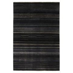 Rug & Kilim: Tappeto moderno a righe e strisce grigie, blu e nere.