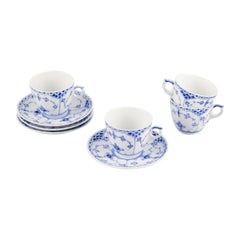Royal Copenhagen Blue Fluted Half Lace, four pairs of coffee cups and saucers.