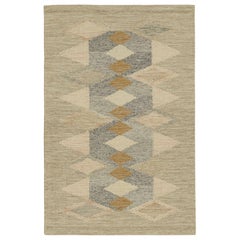 Tapis de style scandinave beige et gris à motifs géométriques de Rug & Kilim