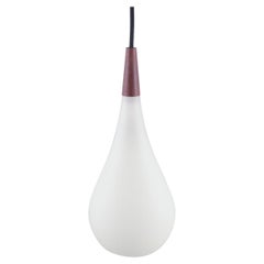 Louis Poulsen pendant in opal glass and precious wood. 1960s