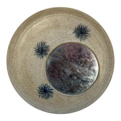 A ceramic mirror