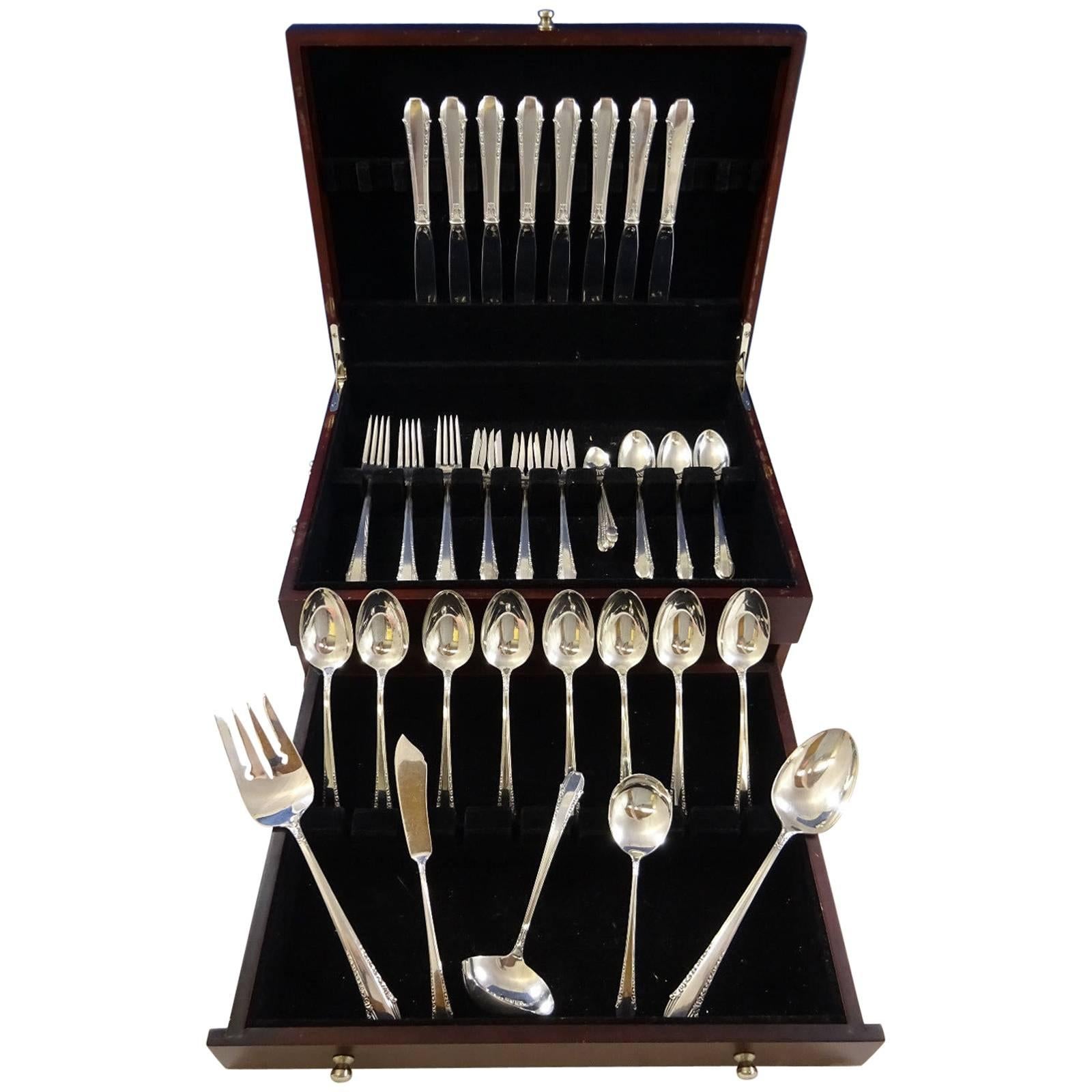 Enchantress by International sterling silver flatware set of 53 pieces. This set includes:

Eight knives, 8 7/8