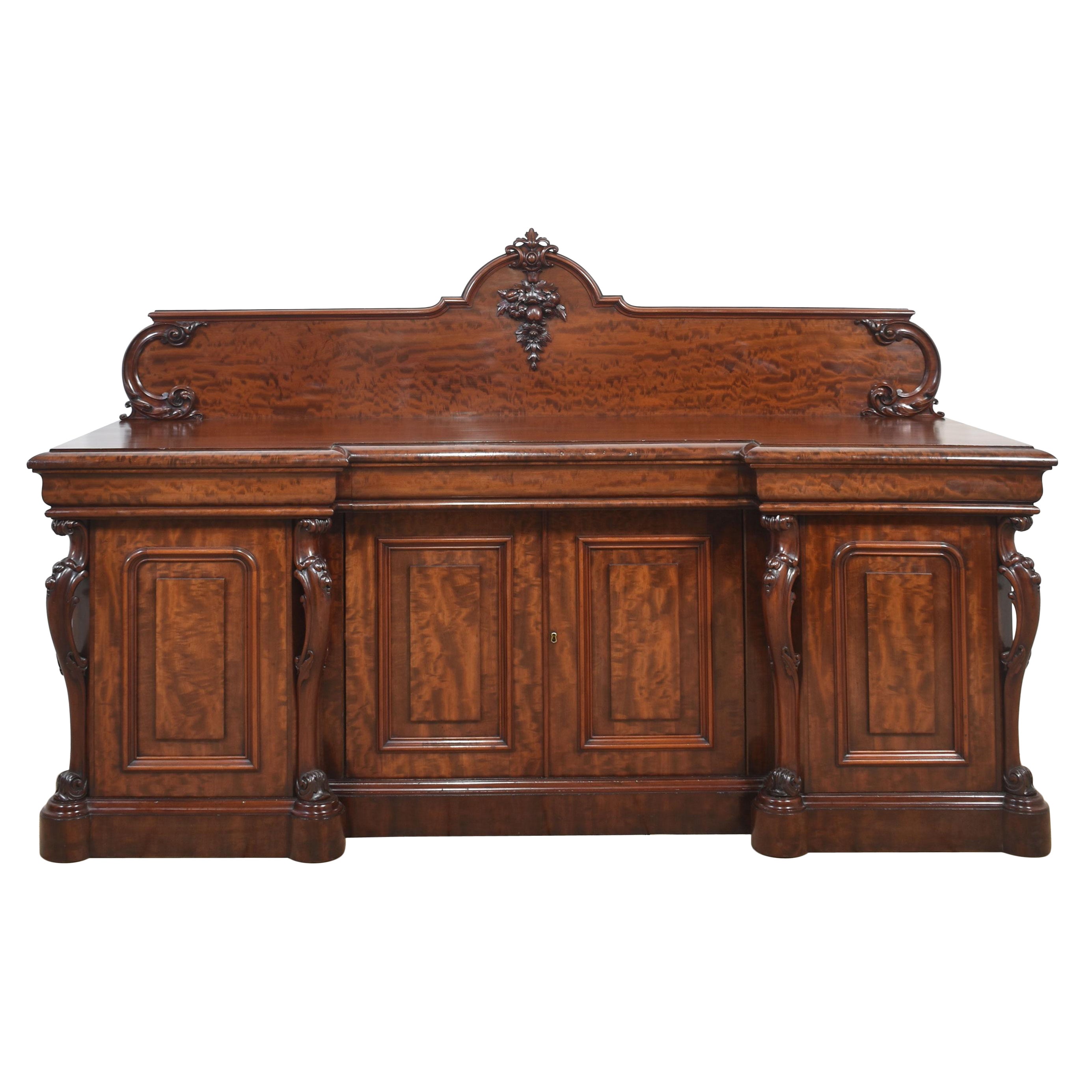 Large figured mahogany breakfront sideboard For Sale