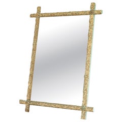 Miroir sculpté, doré et peint