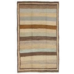 Tapis Tulu ancien avec des bandes de couleurs modernes et multiples
