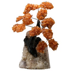Árbol de gemas de citrino sobre base de racimo de cuarzo