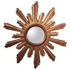 Vintage Mid-20th Century French Carved Wall Sunburst Mirror with Gilt Finish