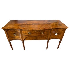 Early Sheraton Period Flame Mahogany Serpentine Sideboard