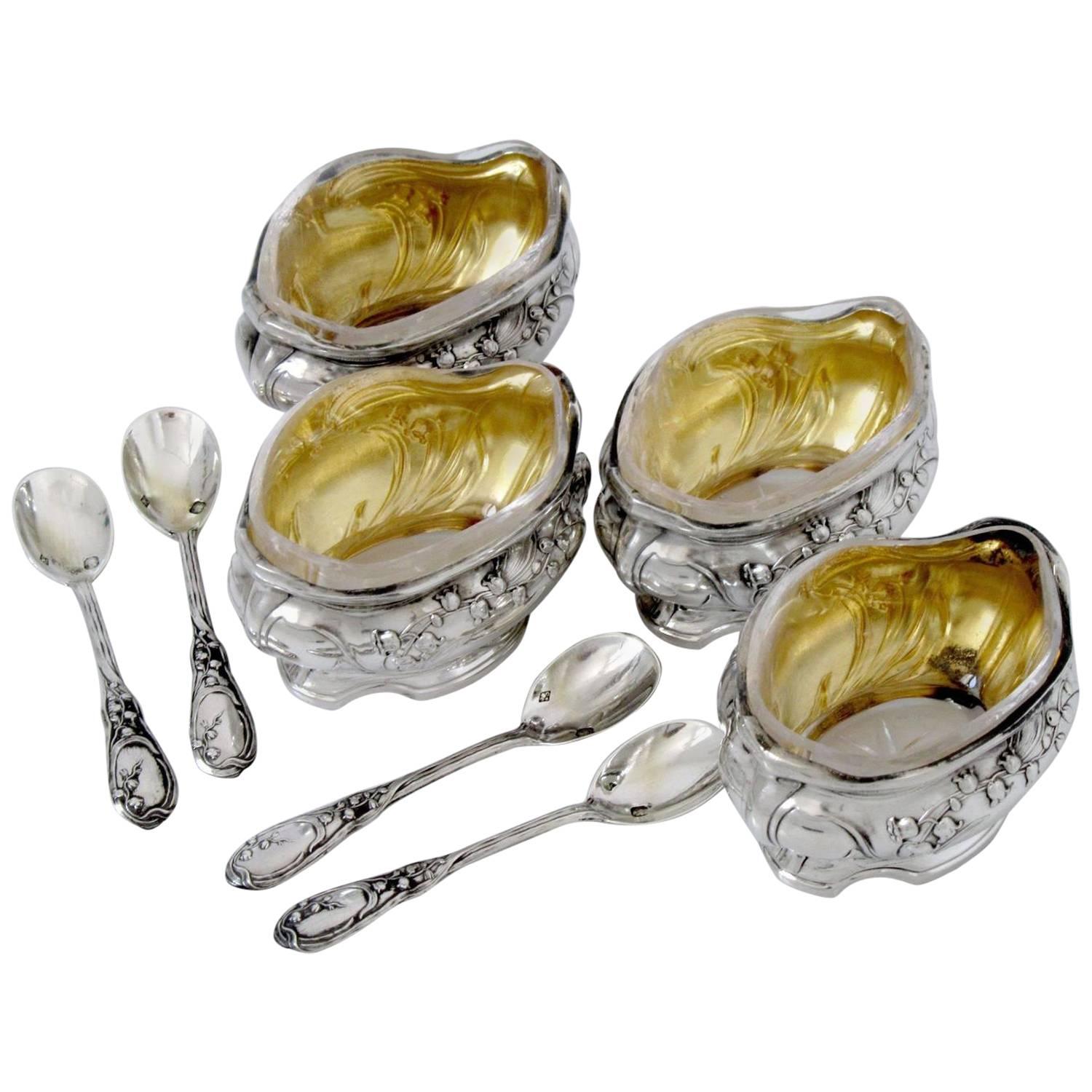 Fabulous French sterling silver 18k Gold set of four salt cellars spoons box lily of the valley.

Head of Minerve 1 st titre for 950/1000 on salt cellars and spoons for 950/1000 French sterling silver vermeil guarantee. The quality of the gold used