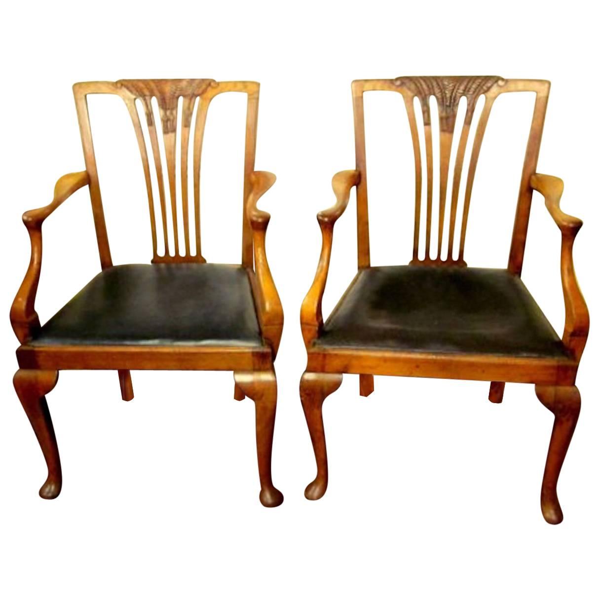 Pair of Antique English Hand-Carved Chestnut and Elm Geo. I Style Armchairs