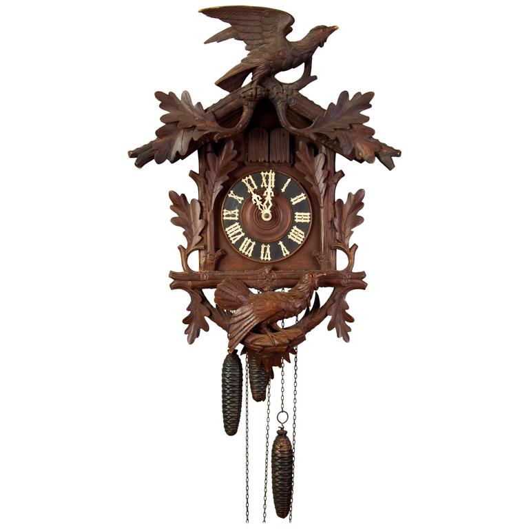 Black Forest Carved Wood Cuckoo Clock with Birds For Sale at 1stdibs