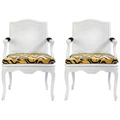 Pair of Louis XV Style Painted Cane and Carved Wood Armchairs
