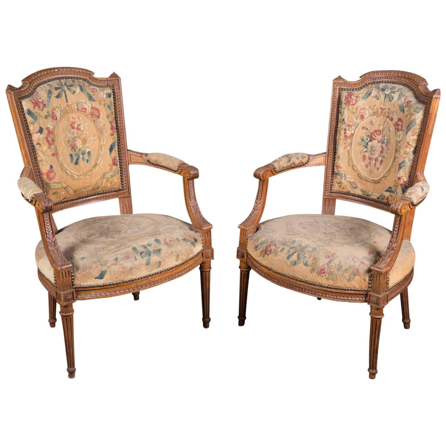 Pair of 19th century Louis XVI Walnut Armchairs with Original Petit-Point For Sale