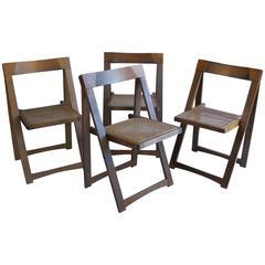 Set of Four Mid-Century Walnut Folding Chairs with Caned Seats
