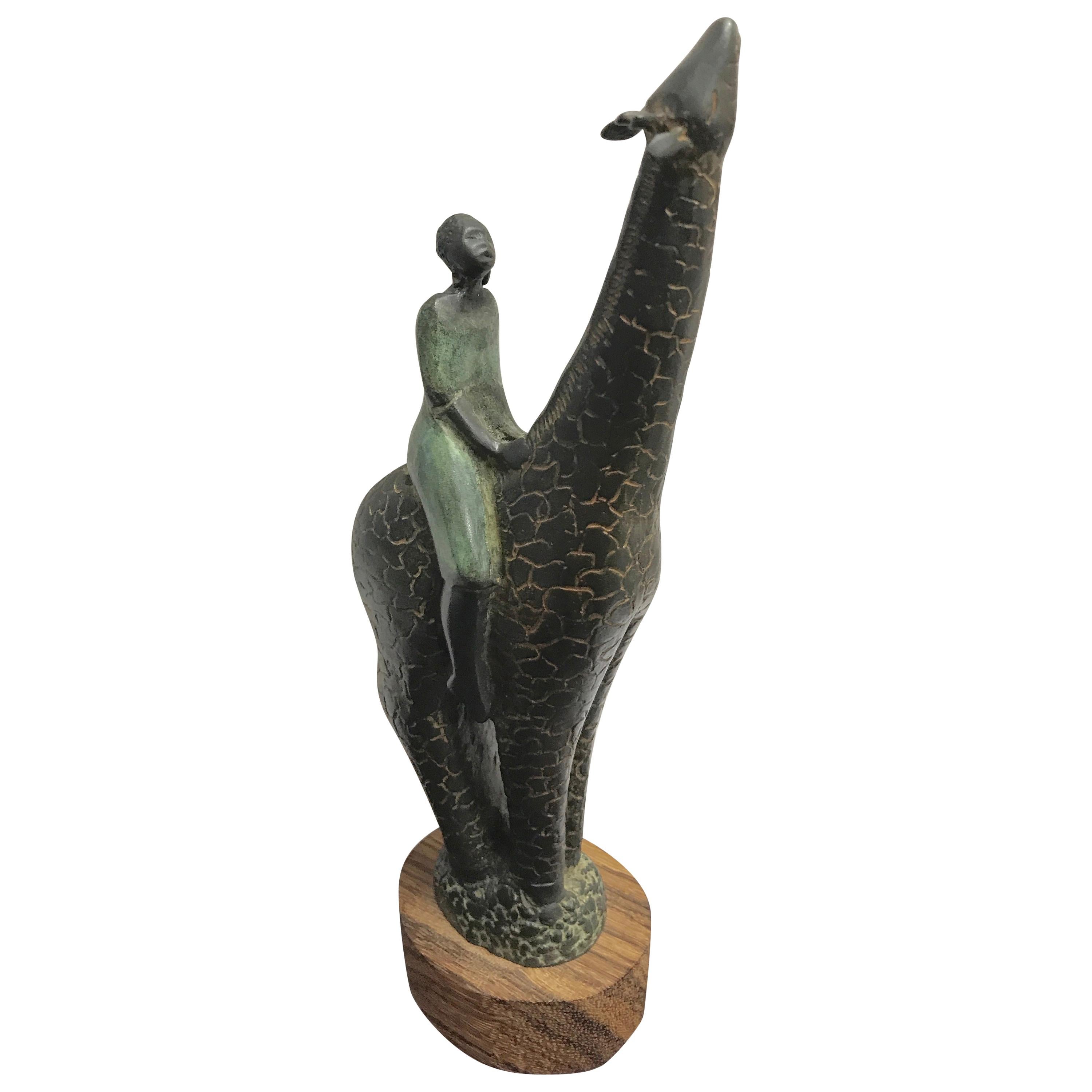 Bronze de l'artiste du Colorado Craig Lehmann Giraffe avec un cavalier africain