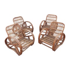 Set of four rattan armchairs