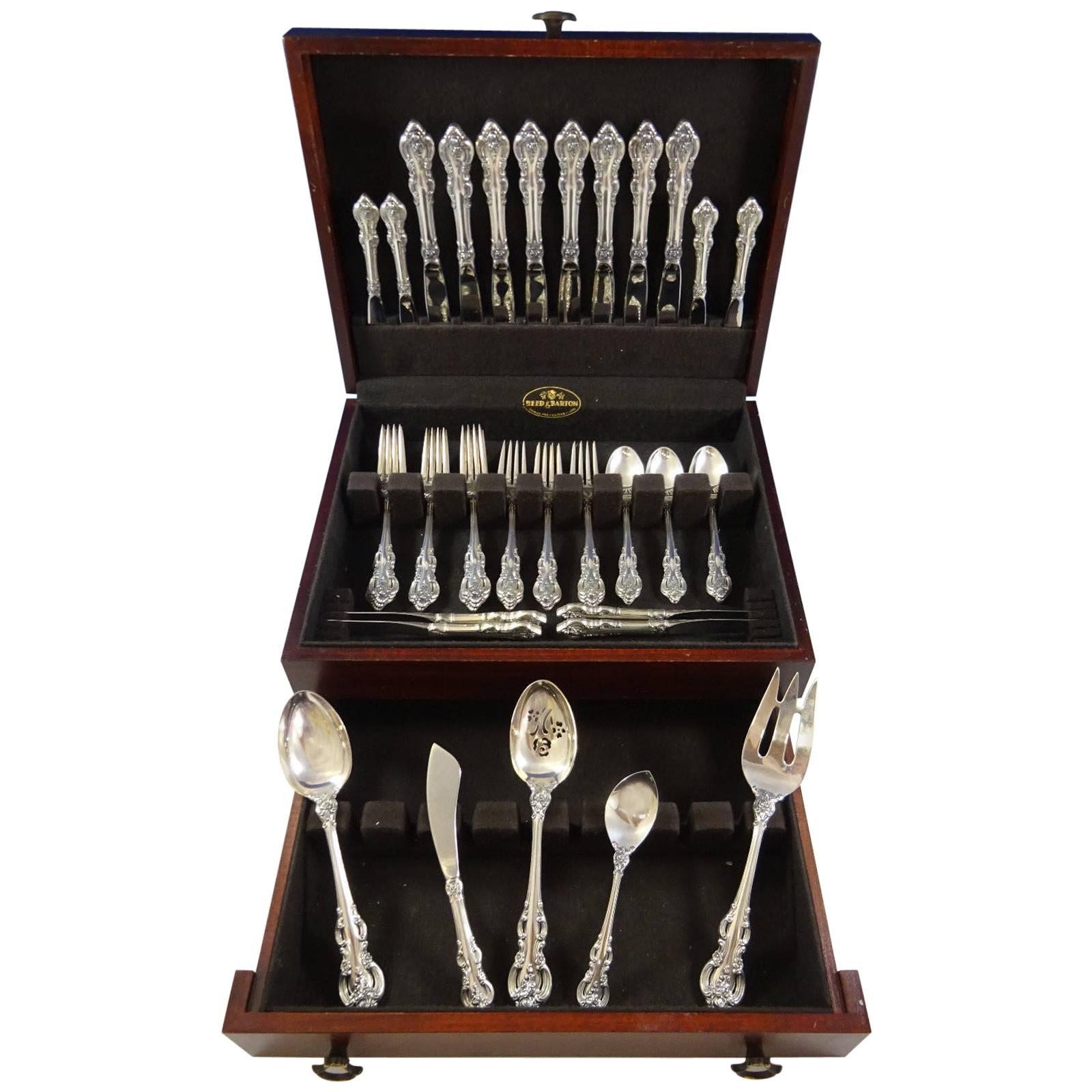 Lavish, handcrafted detailing graces the stem and handle of this pattern. El Grandee is a richly designed, highly sophisticated addition to any formal setting.
 
 El Grandee by Towle sterling silver flatware set of 45 pieces. This set