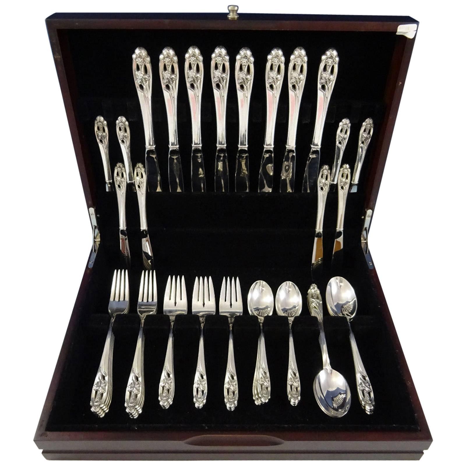 Silver Iris by international sterling silver flatware set with pierced handles, 48 pieces. This set includes:

Eight knives, 9 3/8