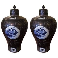 Pair of Striking Black, Blue and White Porcelain Asian Urns