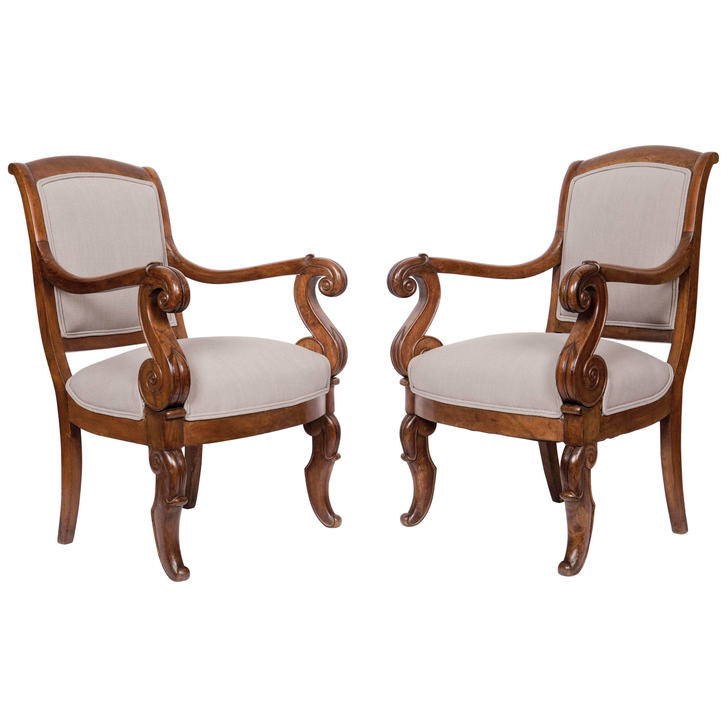Pair of Solid Walnut French Restauration Armchairs