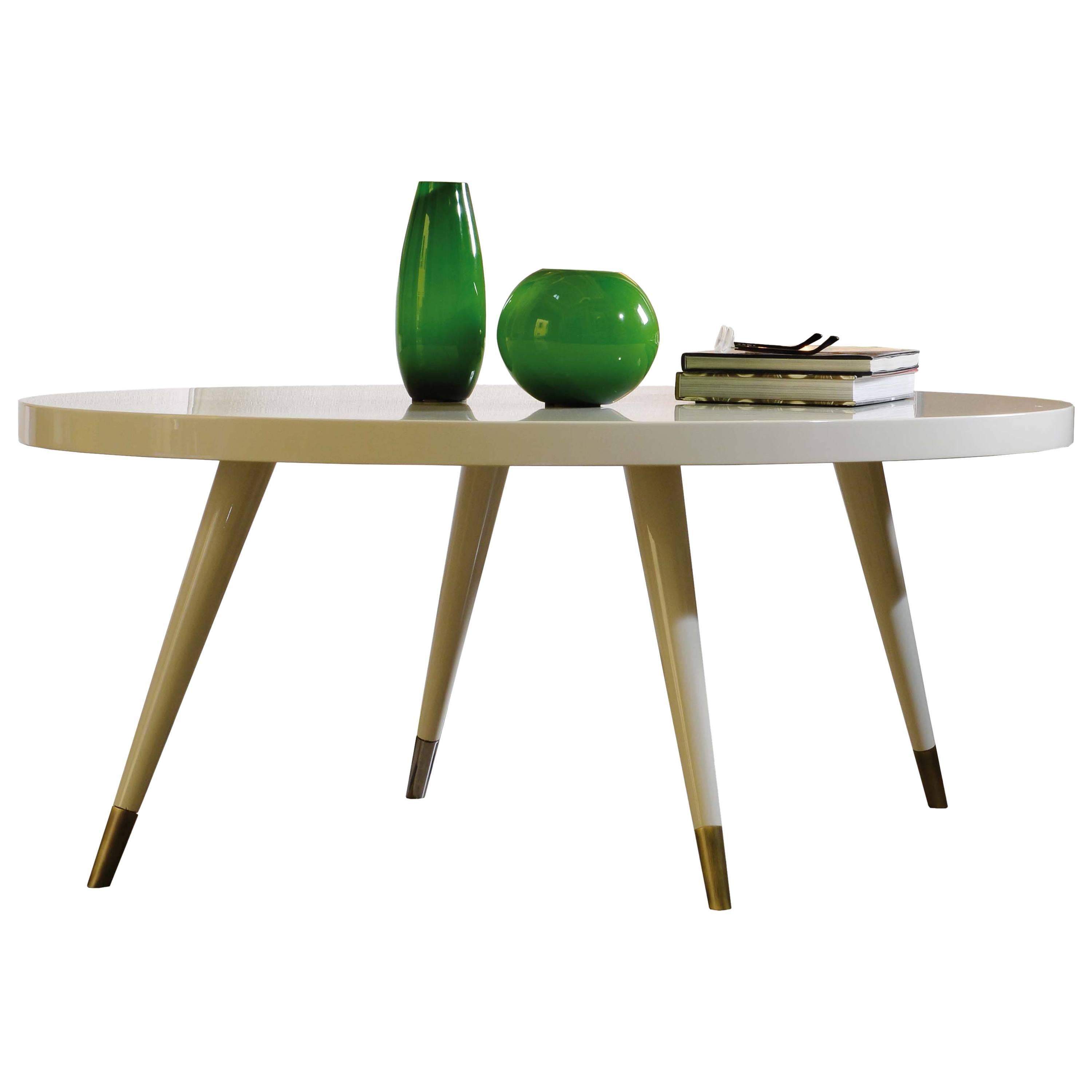 Round, elliptic, square or rectangular small table, mat or gloss lacquered, with gloss brass plated, gloss chromed or bronzed metal tips.

Diam.100cm H45cm-round, square, rectangular or elliptical $2450.
Diam.110cm H45cm-round, square,