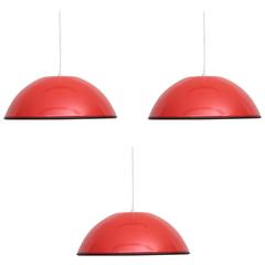 Set of Three Castiglioni Release Pendant Lamps in Red for Flos, Italy, 1962