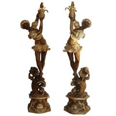 Early 20th Century Pair of Lime Tree Sculpted Nubian Carring Ananas