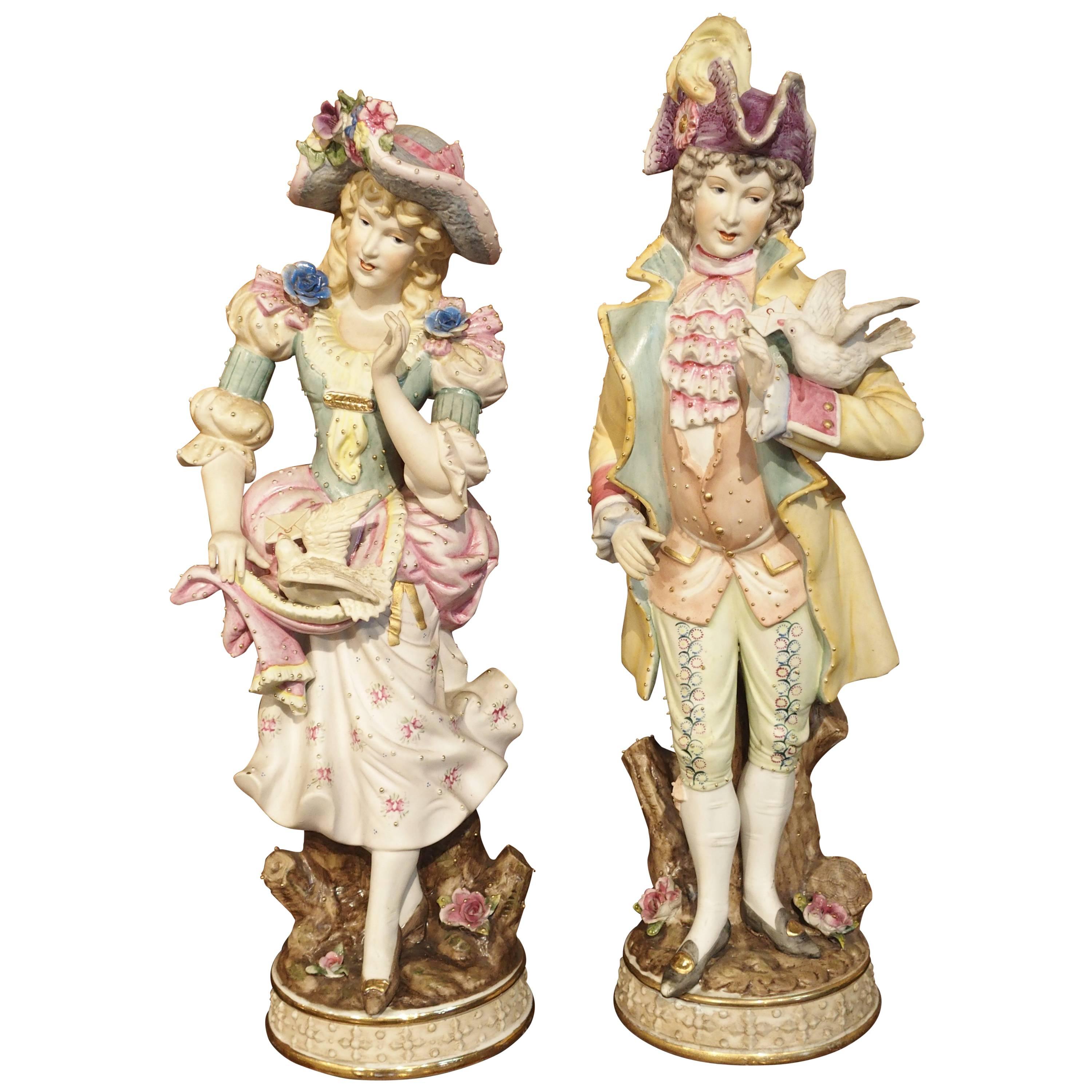 Pair of Early 1900s Hand-Painted Bisque Figures