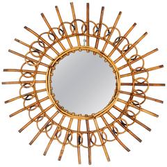 1960s French Riviera Rattan Sunburst Mirror 1960s French Riviera Rattan Sunburst Mirror