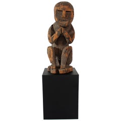 Vintage Naga Effigy Carving of a Squatting Man