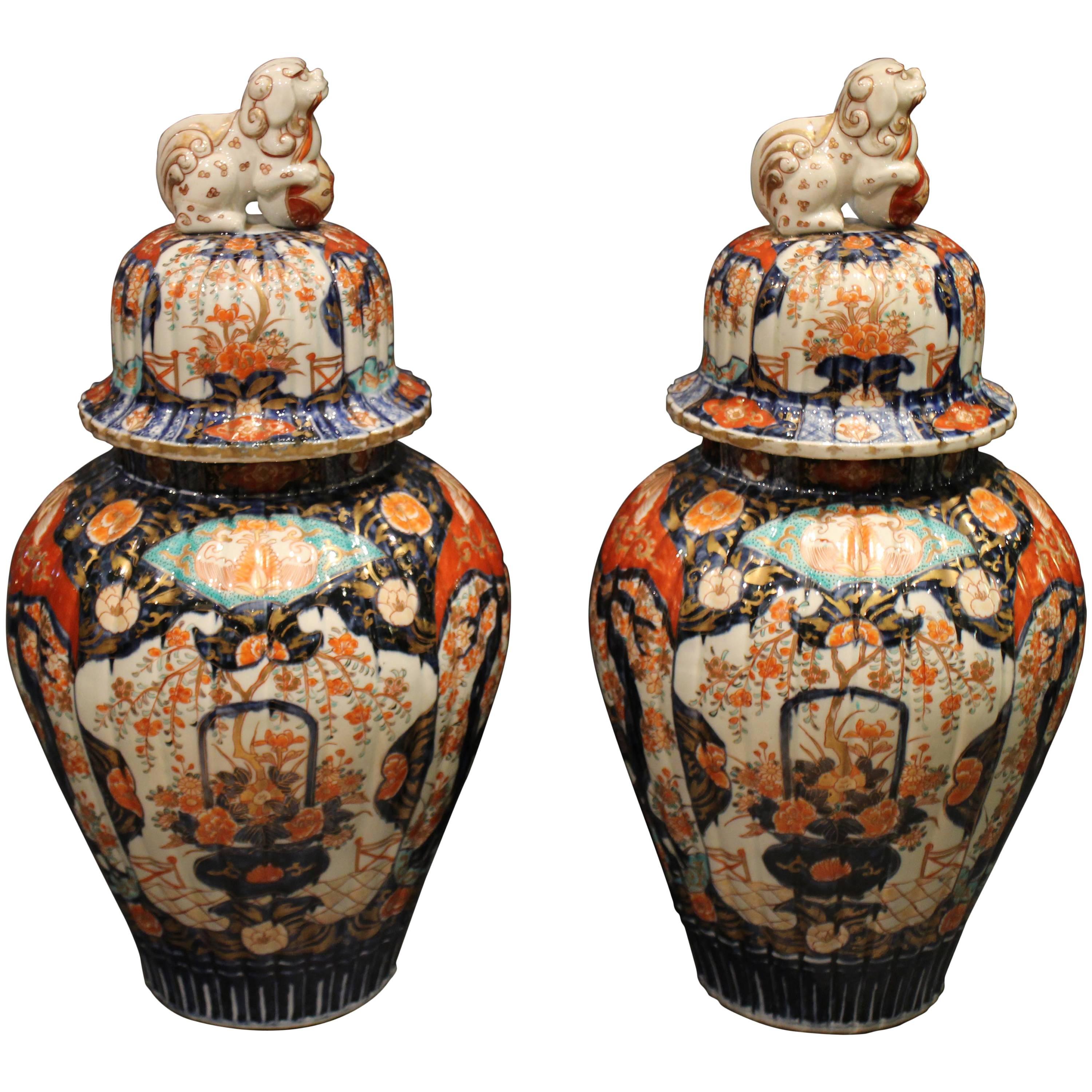 Pair of Antique Japanese Imari Vases and Covers Decorated in Blue and Orange