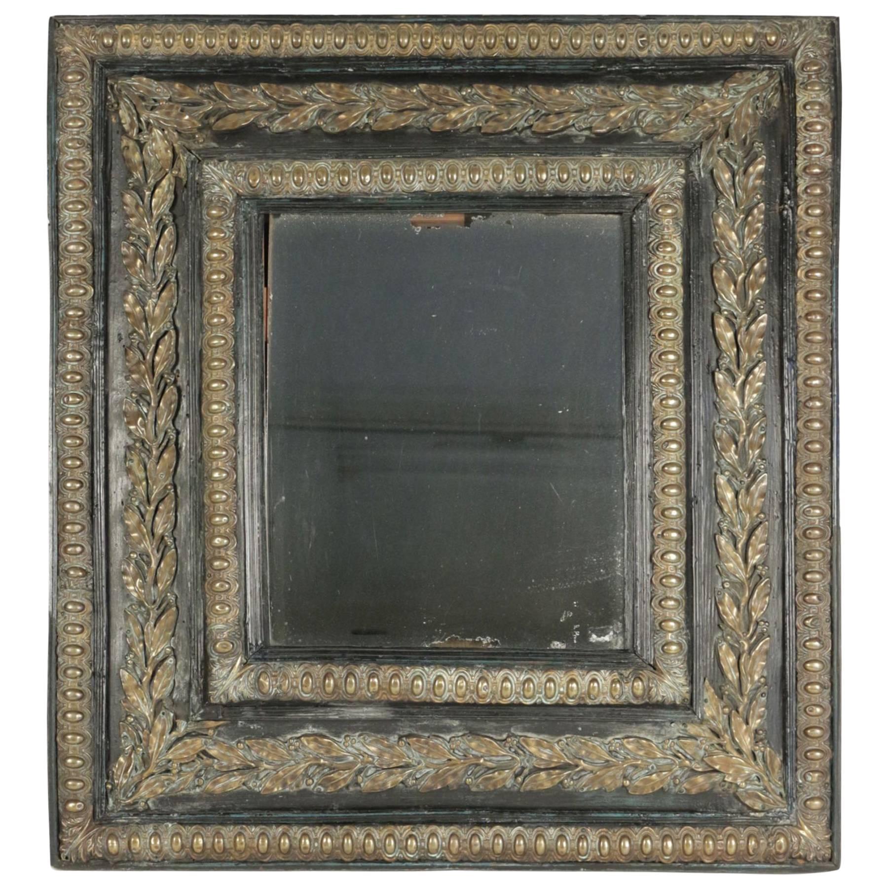 19th Century Mirror with its Original Mercury Glass in Ebonized Wood with Brass