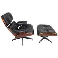 Eames Rosewood 670 Lounge Chair and 671 Ottoman in Black Leather