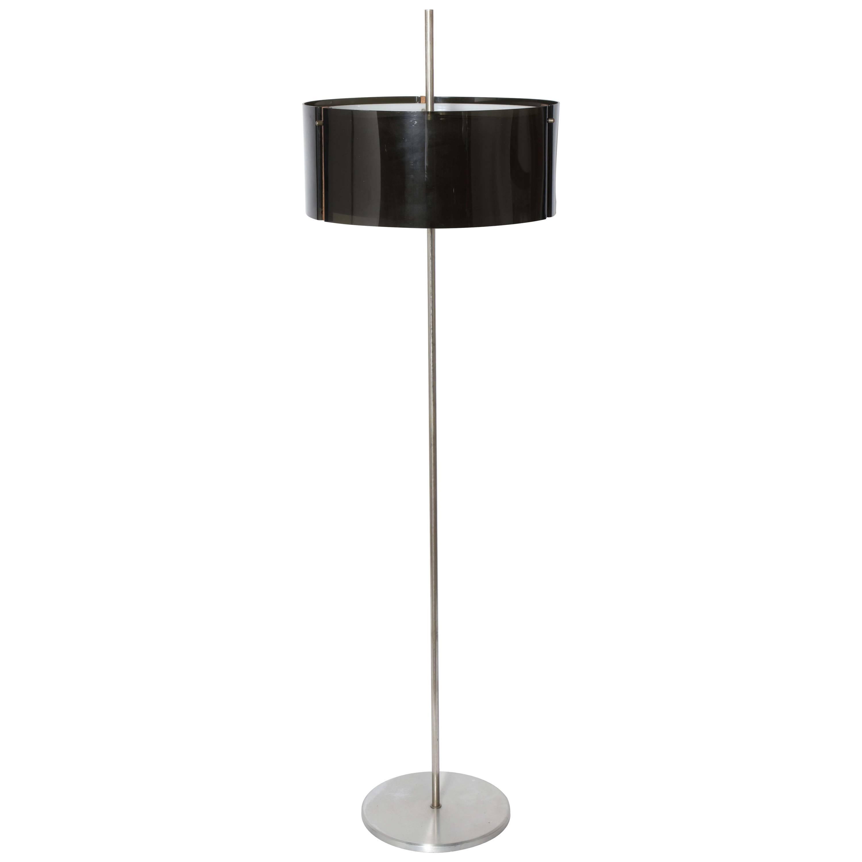 Scandinavian Modern Brushed Aluminum Double Shade Reading Floor Lamp with Outer Shade in Smoky Grey, Inner Shade in Off White Lucite, clasped with Wood details. Featuring a thin tubular Brushed Aluminum stem, round Brushed Aluminum top, tripod top