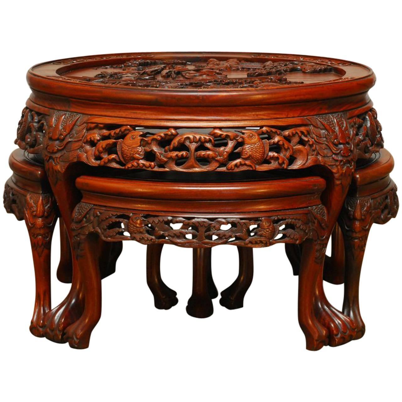 Round Chinese Carved Rosewood Tea Table with Nesting Stools For Sale at